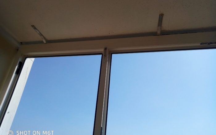 Остекление балкона с внутренней обшивкой деревянной вагонкой/ г. Вишгород, ул. Кургузова 11-Б